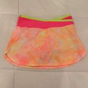 Ivviva tie-dye neon coloured tennis skirt with undershorts. US size 10.